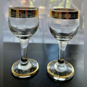 2 vintage stemmed cordial glasses with 24KT gold rim. 4.5”.